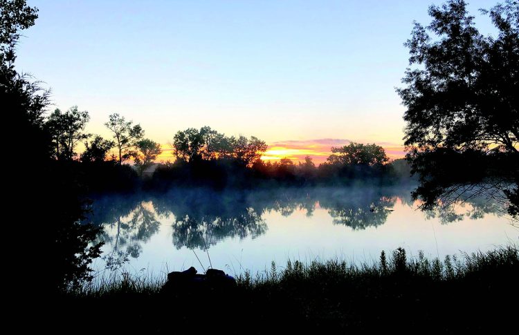 A TYPICAL JUNE MORNING ON A TYPICAL NEBRASKA I-80 LARGEMOUTH POND.